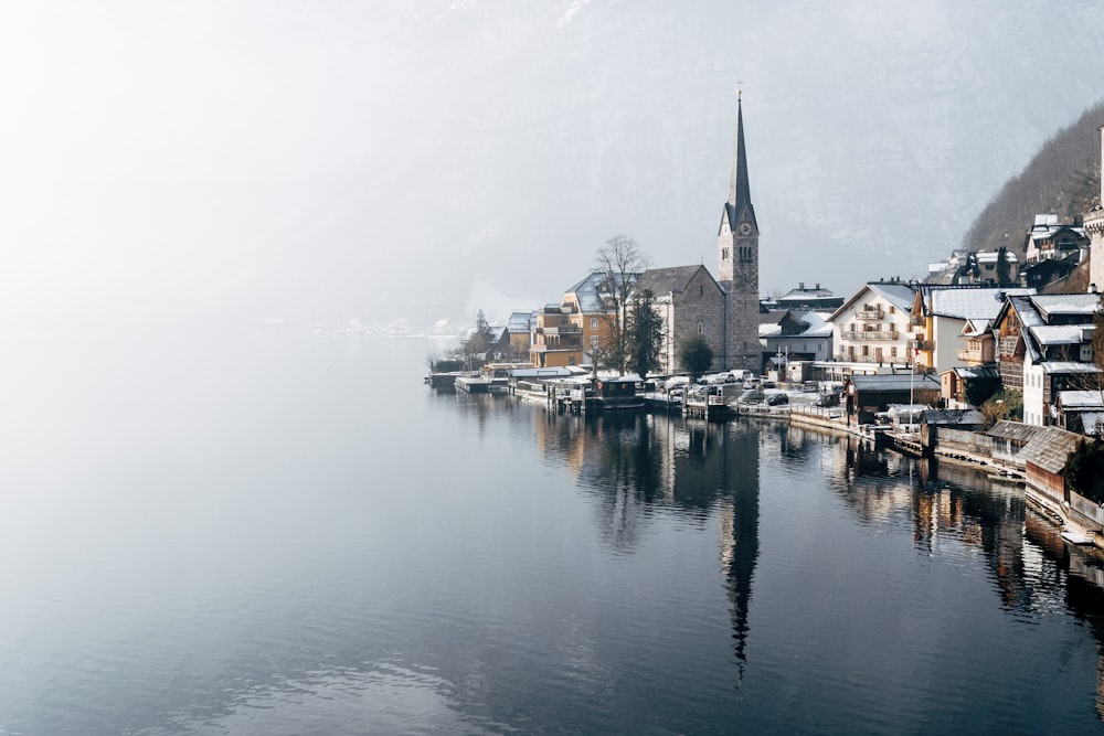 houses near body of water during daytime