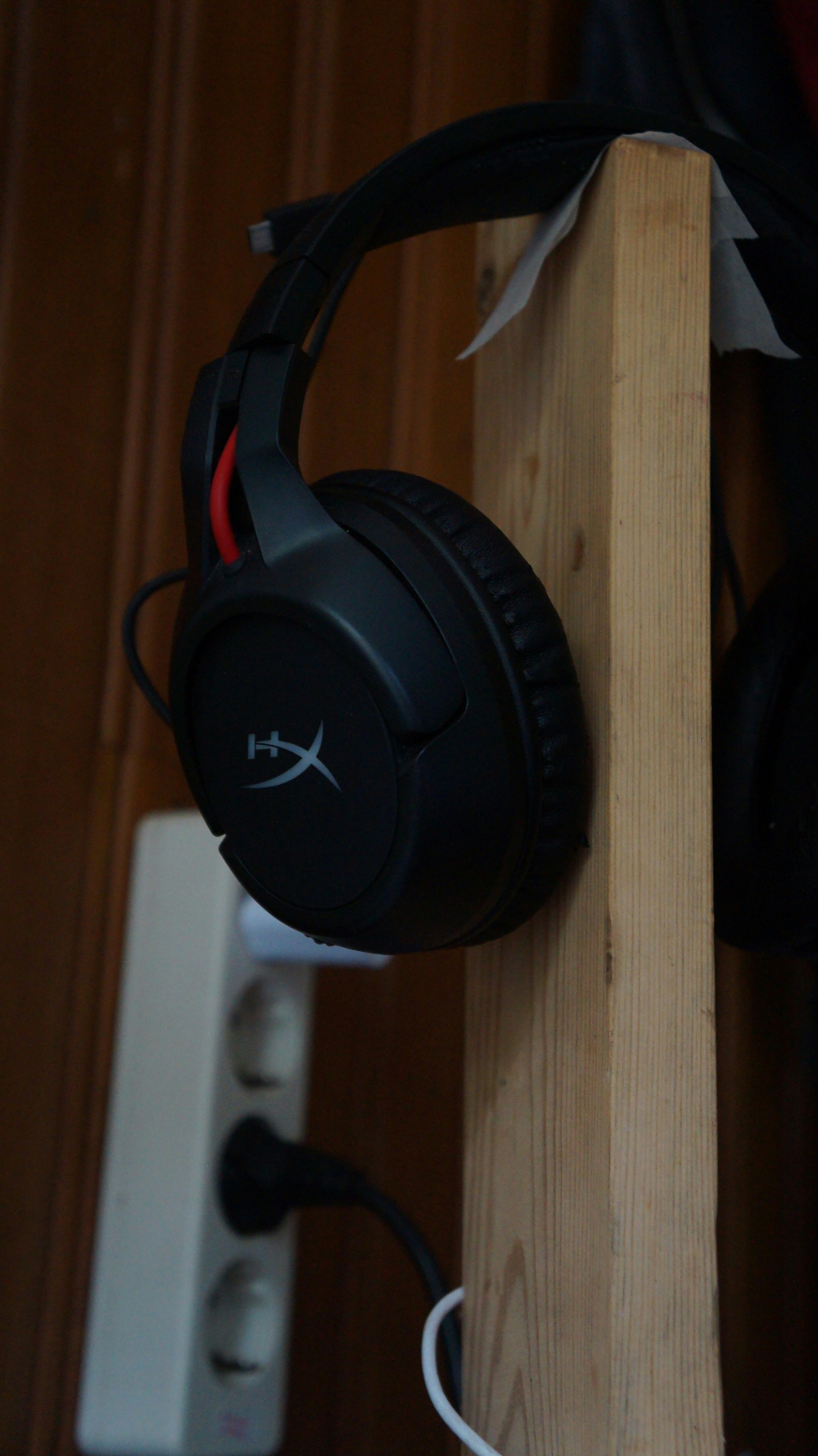 black and red corded headphones