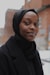 woman in black hijab and black coat