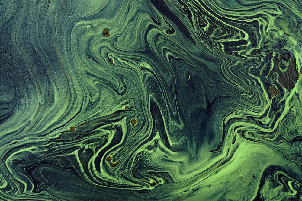 green and black abstract painting