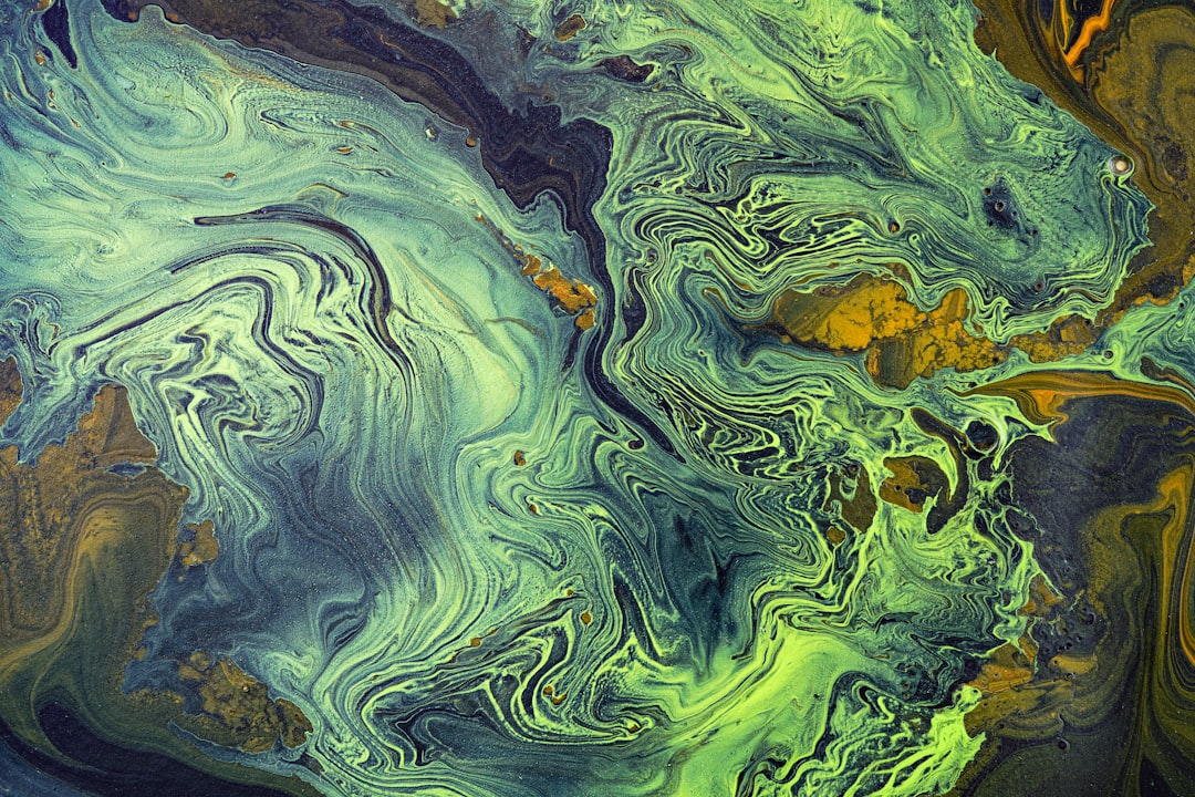 green and brown abstract painting, Green and gold turbulence on black canvas