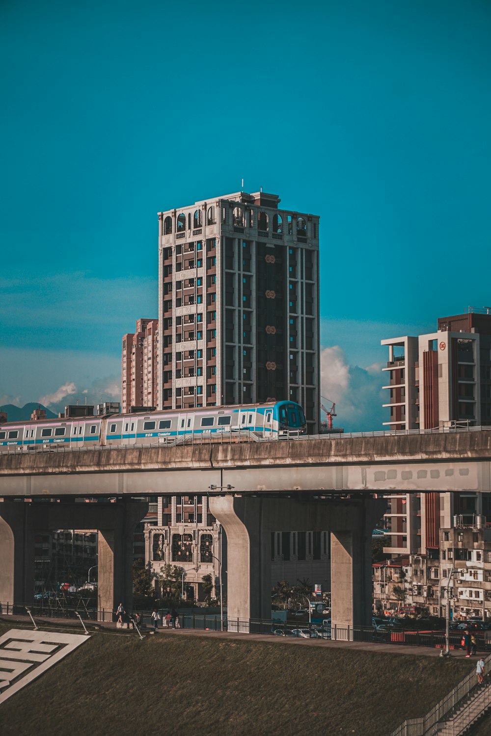 brown and white concrete building under blue sky during daytime