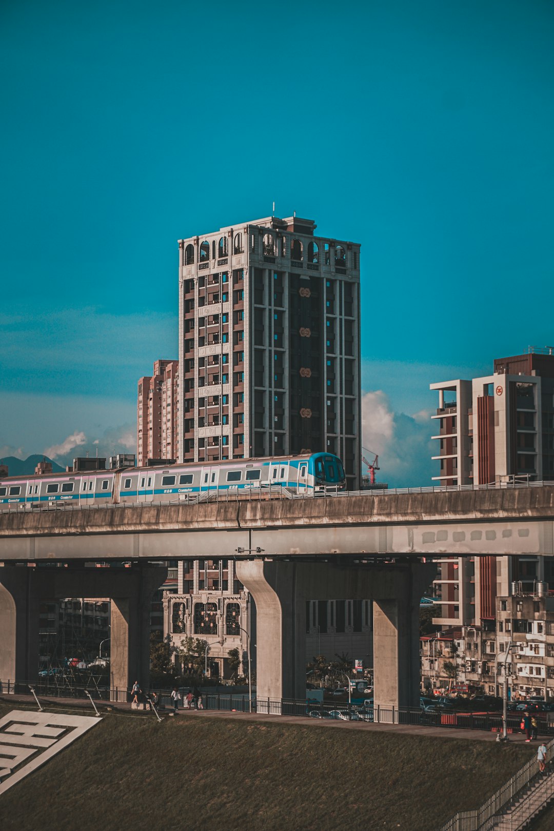 brown and white concrete building under blue sky during daytime