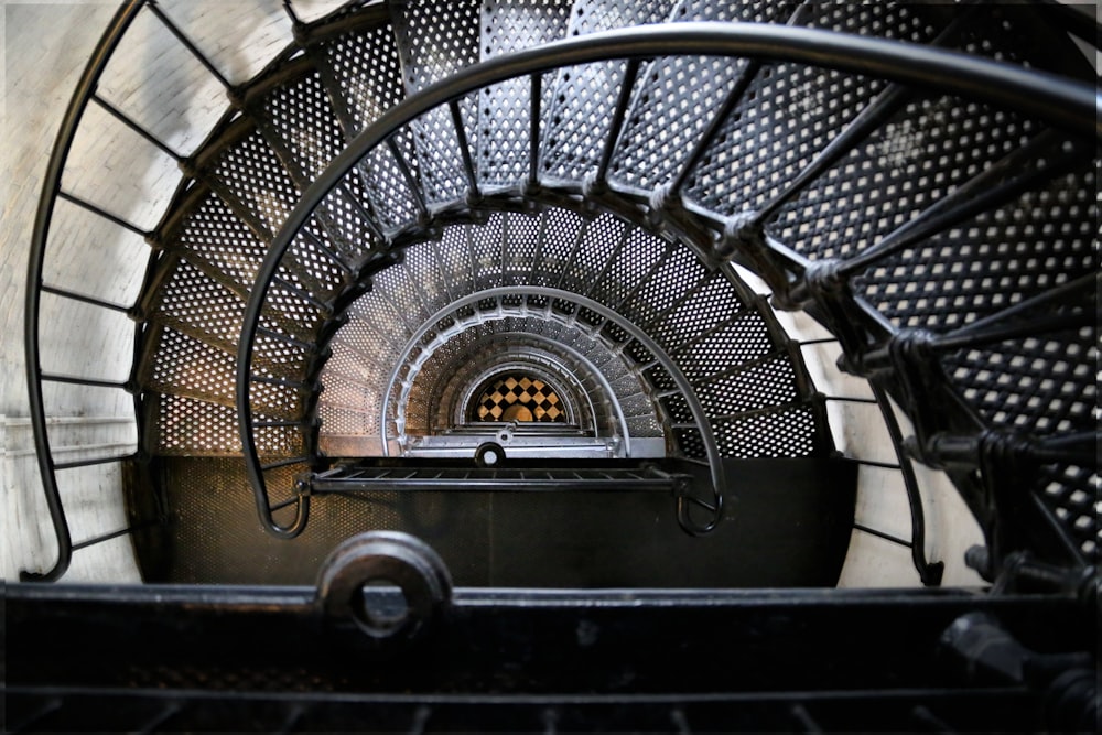 black spiral staircase with black metal railings