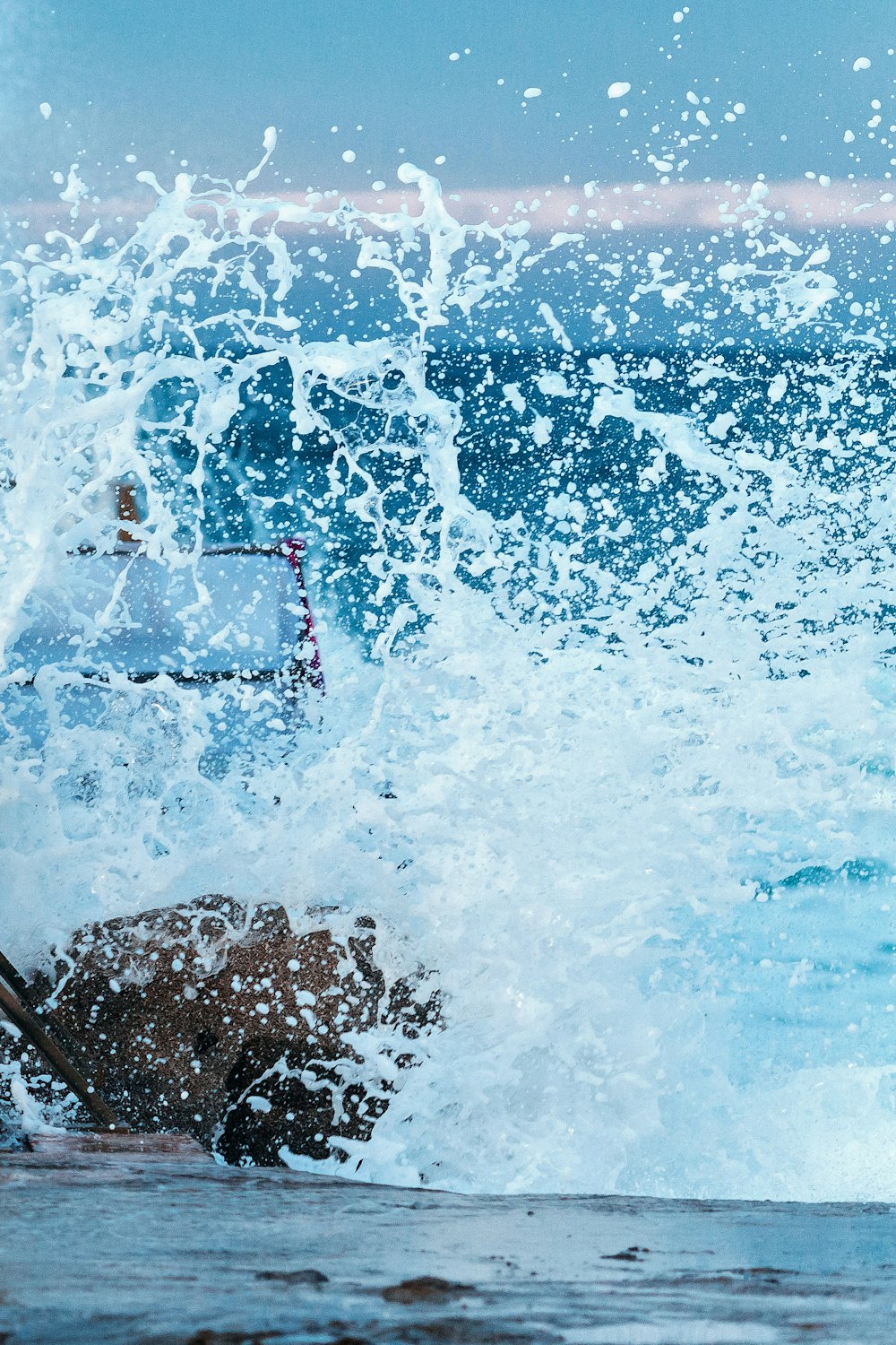 water splash on brown rock