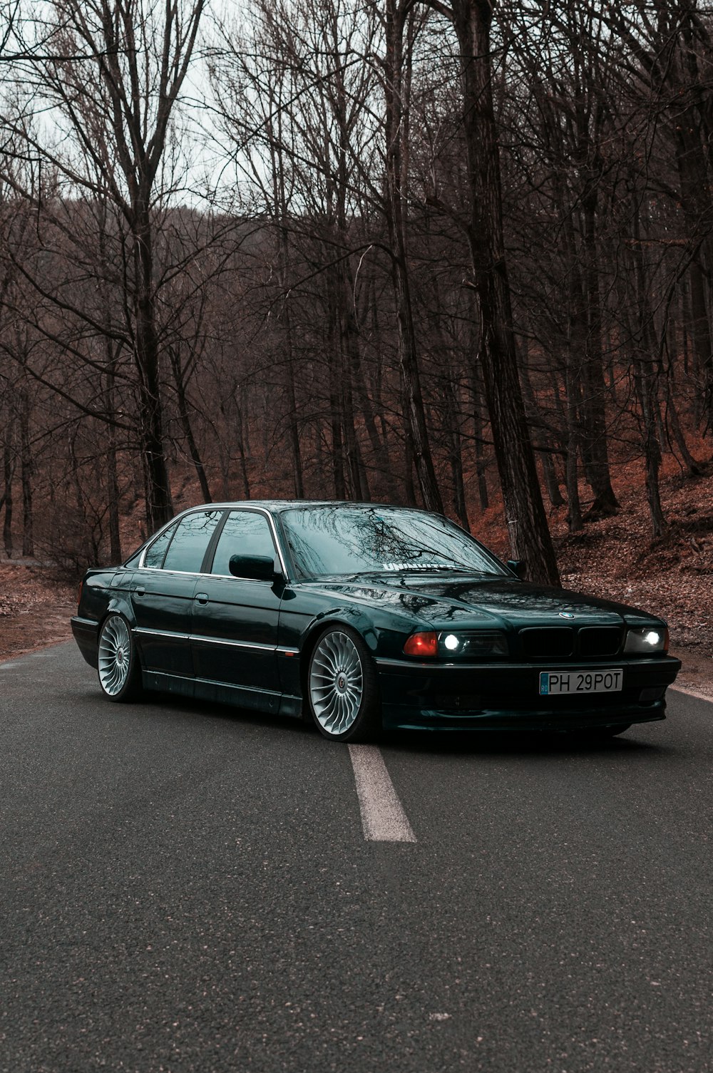 black bmw m 3 on road