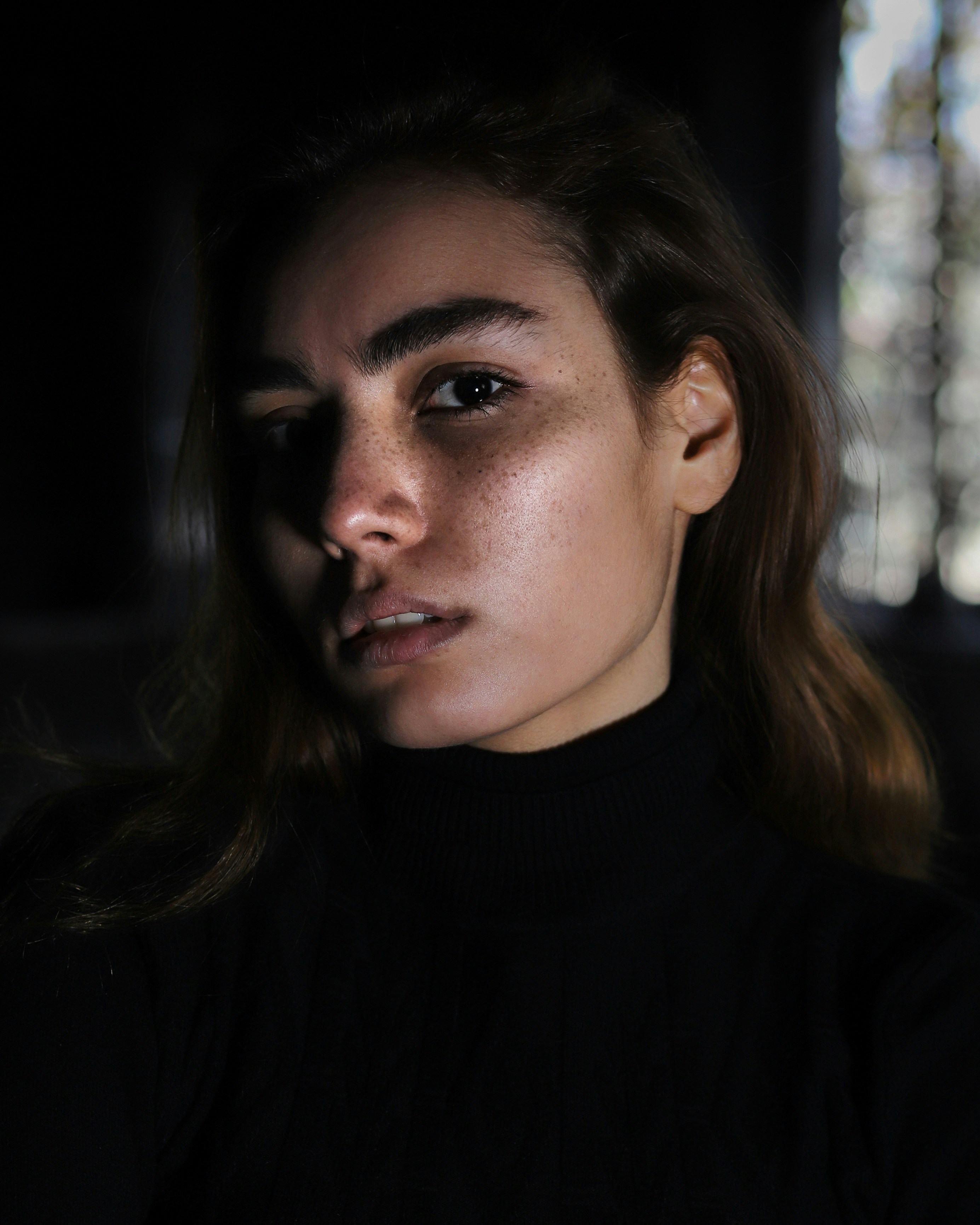 woman in black turtleneck shirt