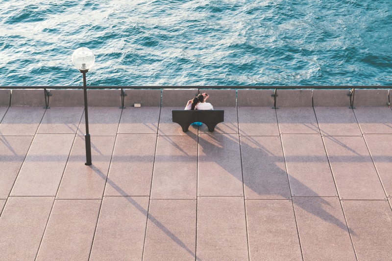 Man relaxing poolside
