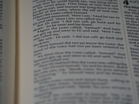 A close-up view of a page from a book with text clearly visible, discussing a narrative involving characters Samuel and Eli.