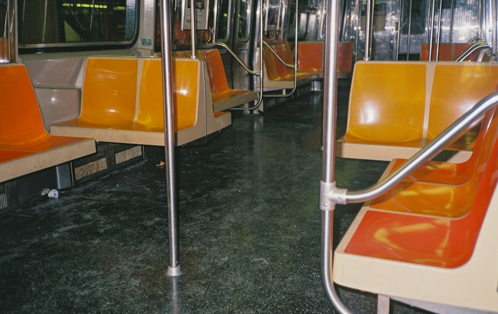 white metal stand near yellow and white train