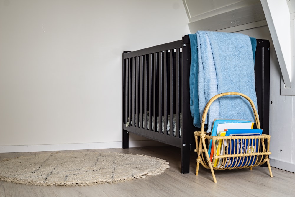 blue textile on brown wooden chair