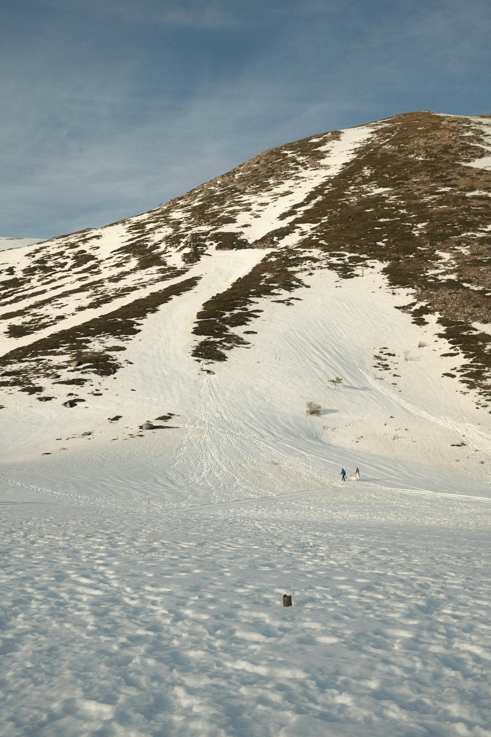 snow covered mountain during daytime