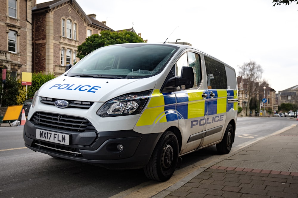 white and blue police car