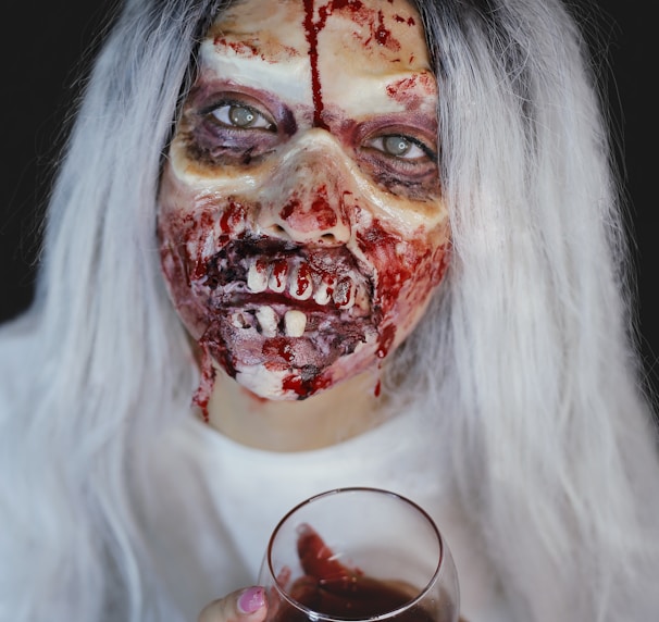 woman with red and black face paint