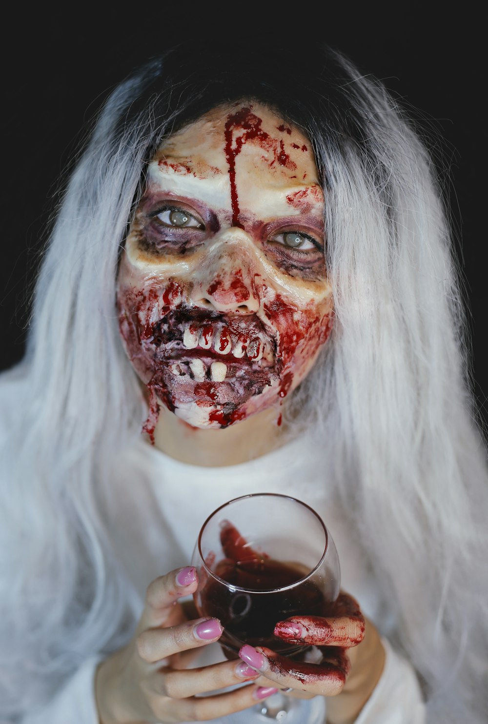 woman with red and black face paint