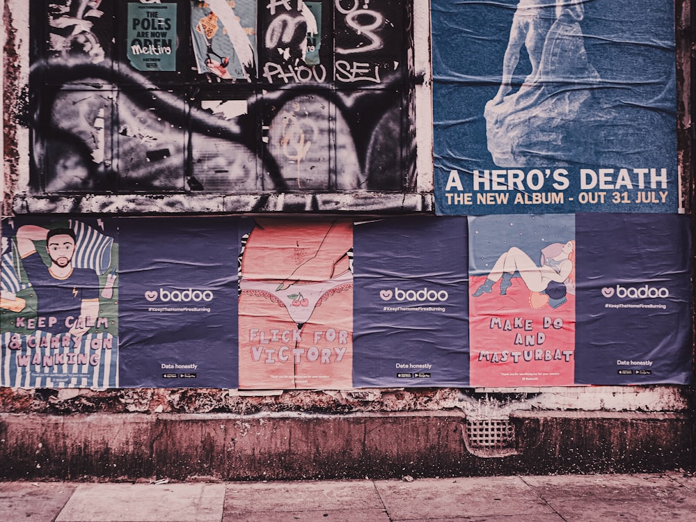 blue and red wall with graffiti