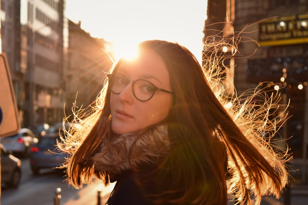 woman in black framed eyeglasses