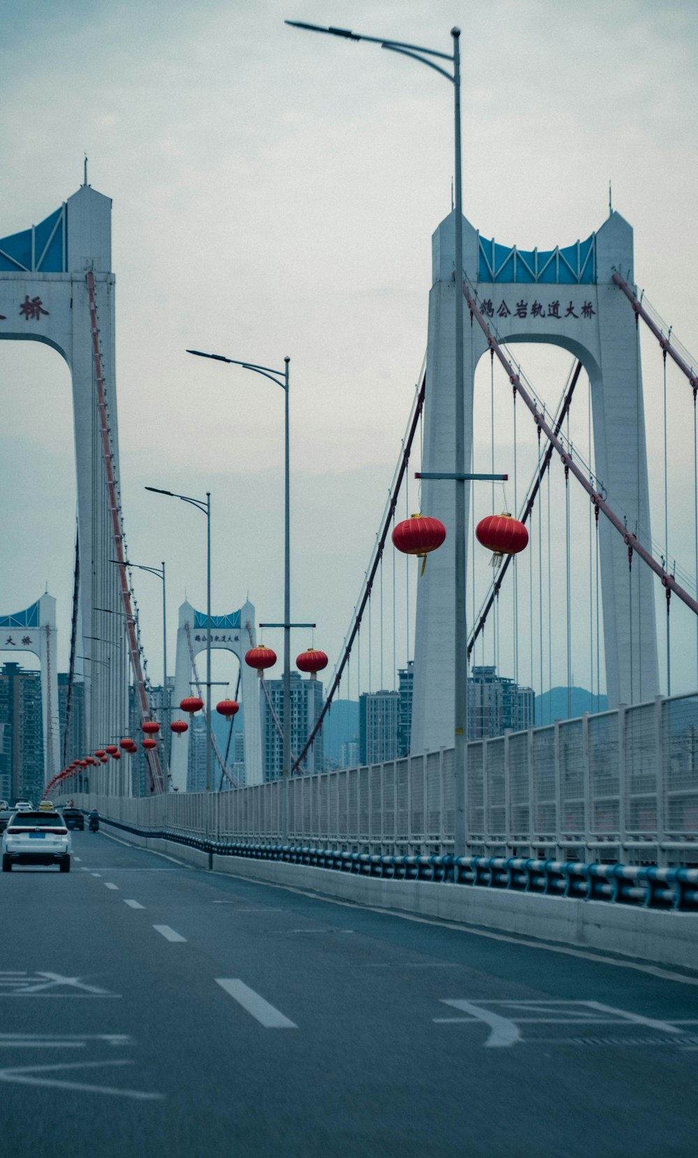 cars on bridge during daytime