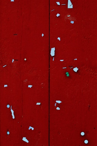 red wooden door with white heart shaped