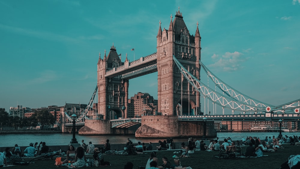 people walking on bridge during daytime