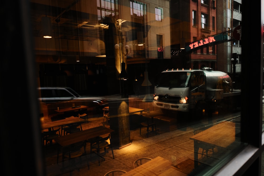 cars parked on side of the road during night time