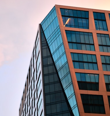 brown concrete building under blue sky during daytime