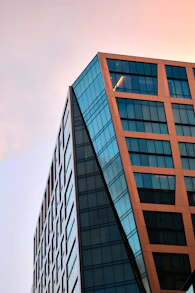 brown concrete building under blue sky during daytime