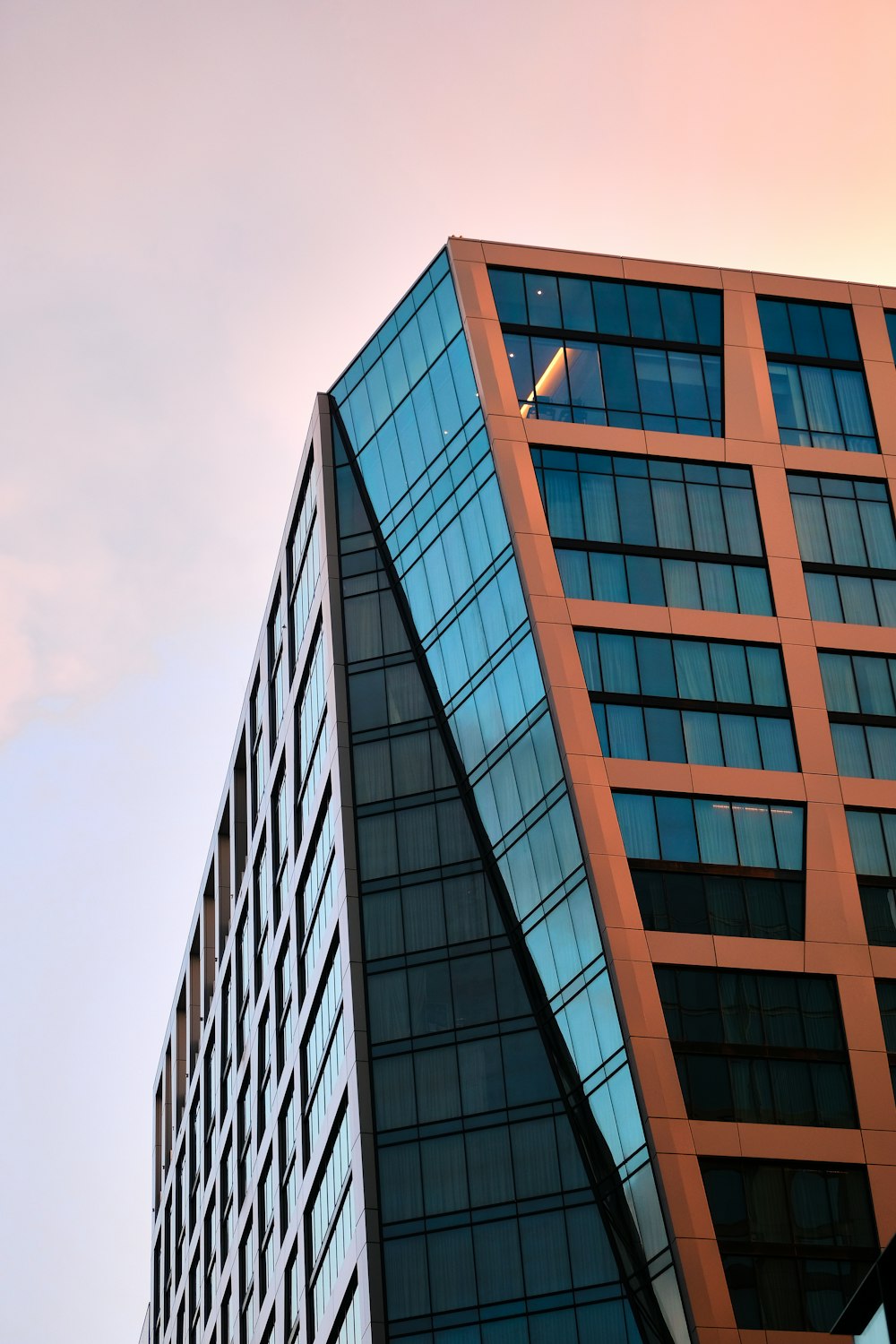 brown concrete building under blue sky during daytime