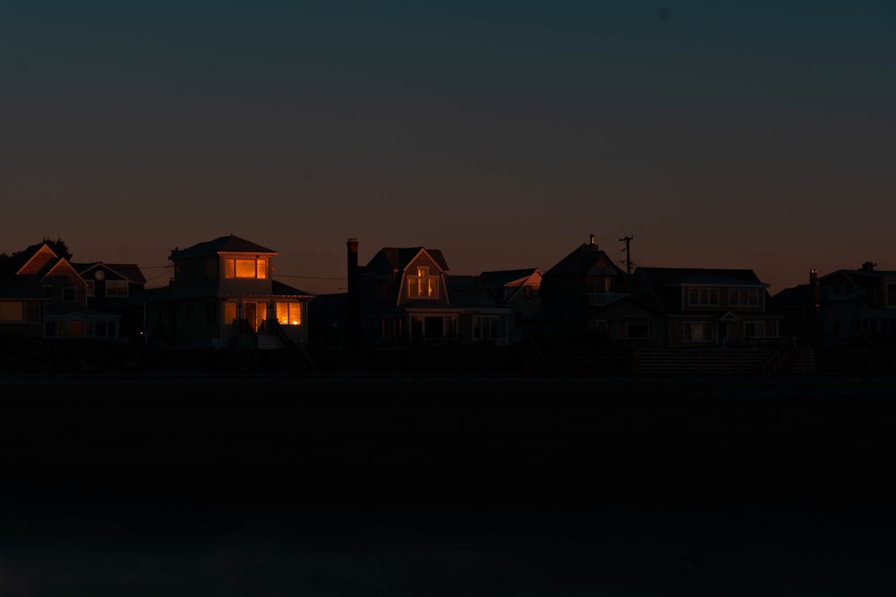 brown and white house during night time