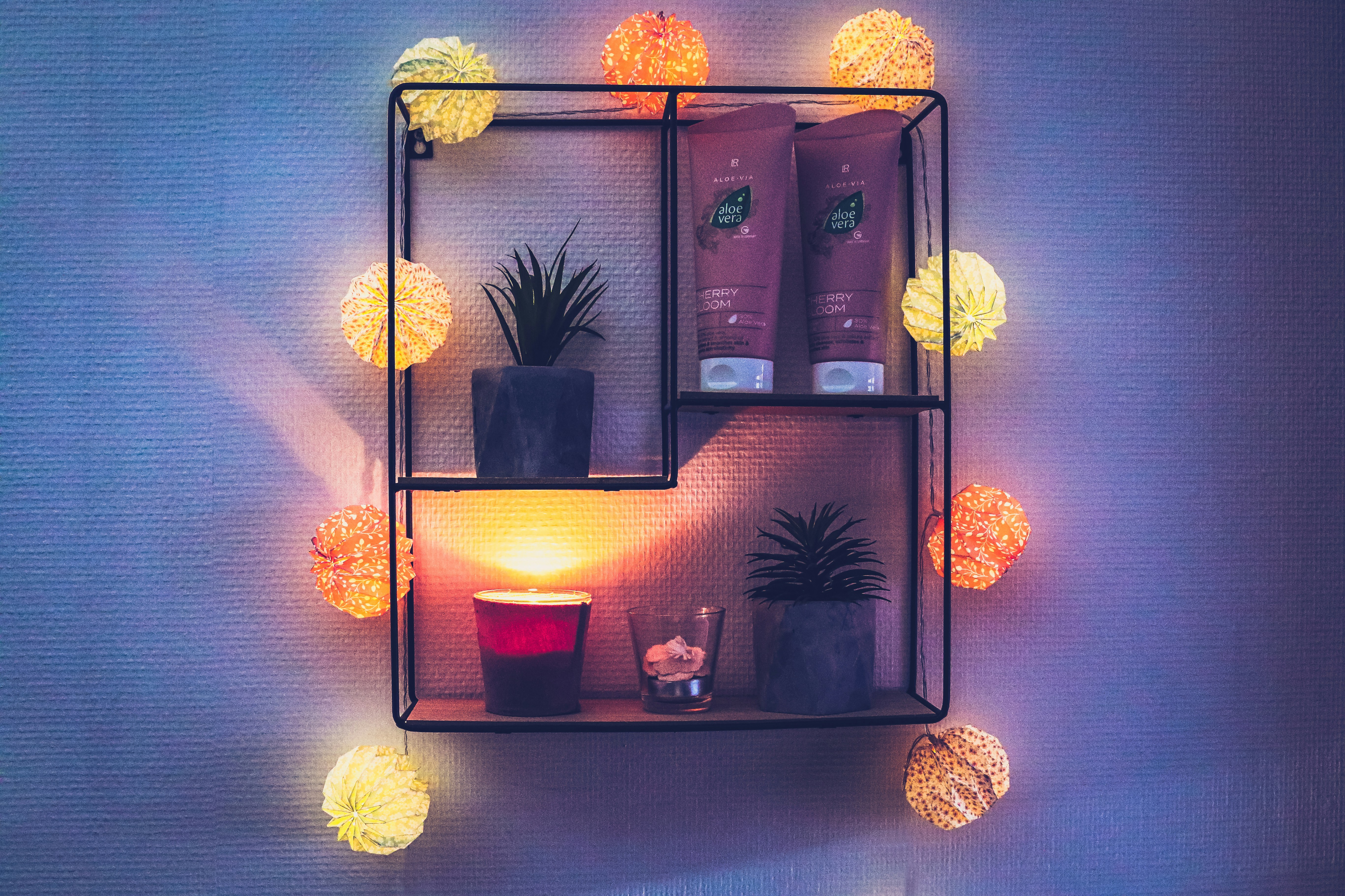 brown wooden shelf with assorted items