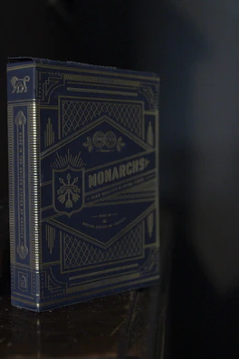 A premium deck box featuring embossed details and rich color tones.
