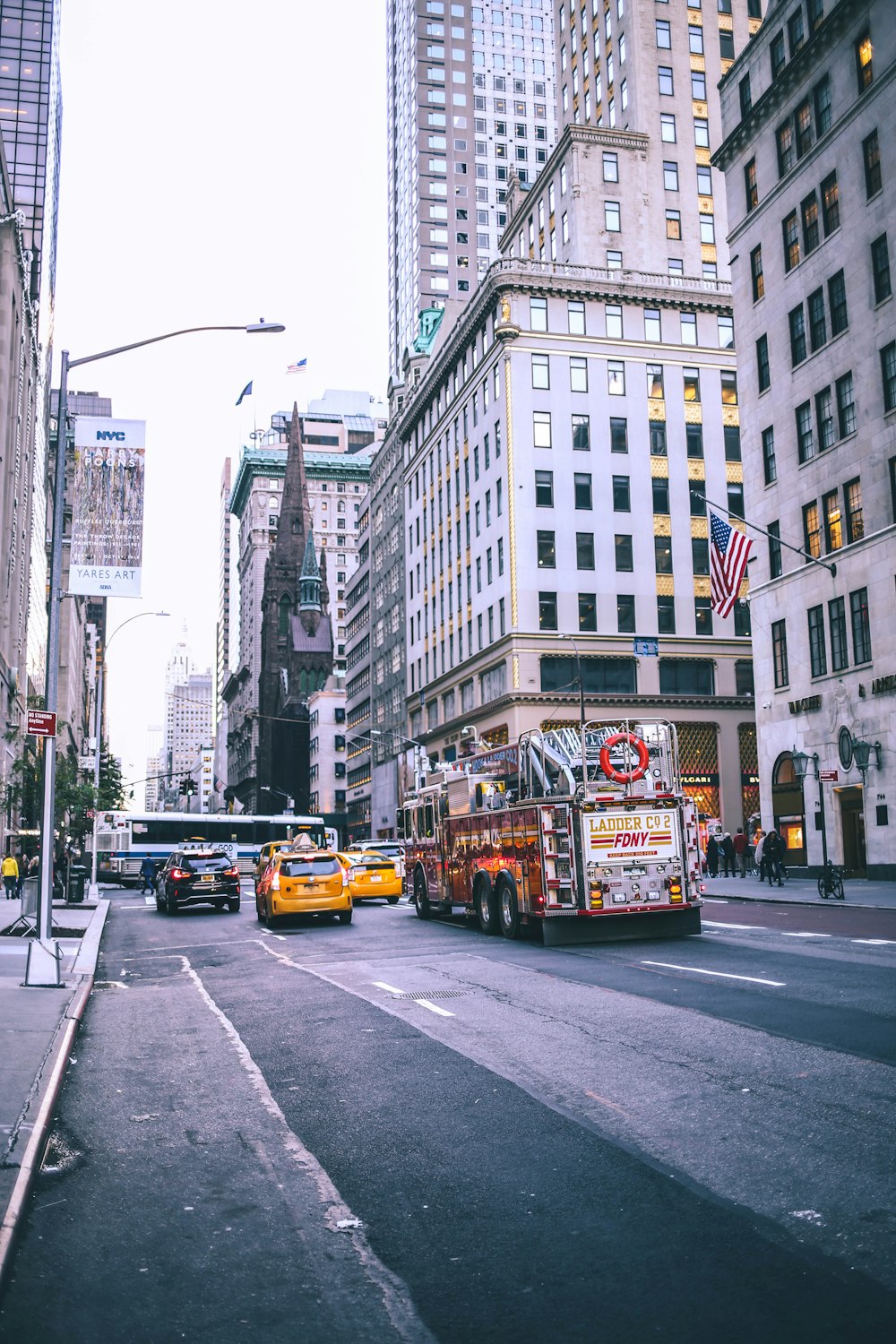 yellow bus on road during daytime