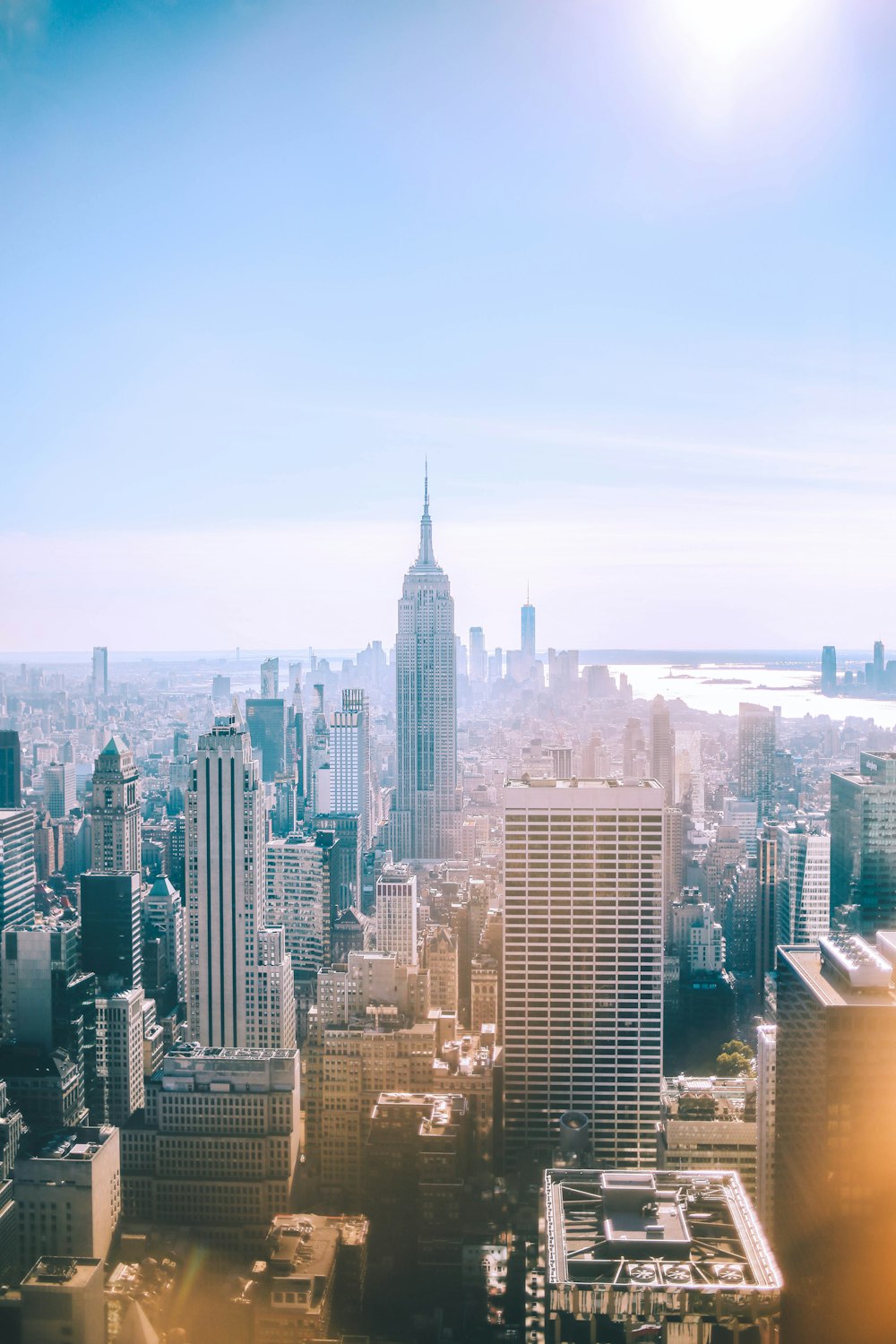 city skyline under blue sky during daytime