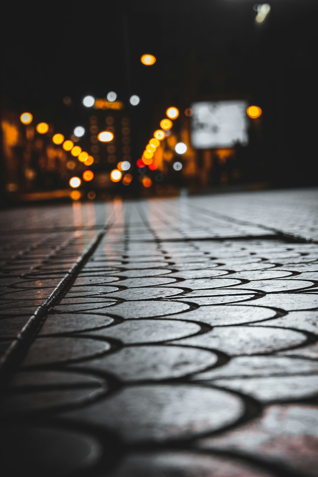 black and white brick pavement during night time