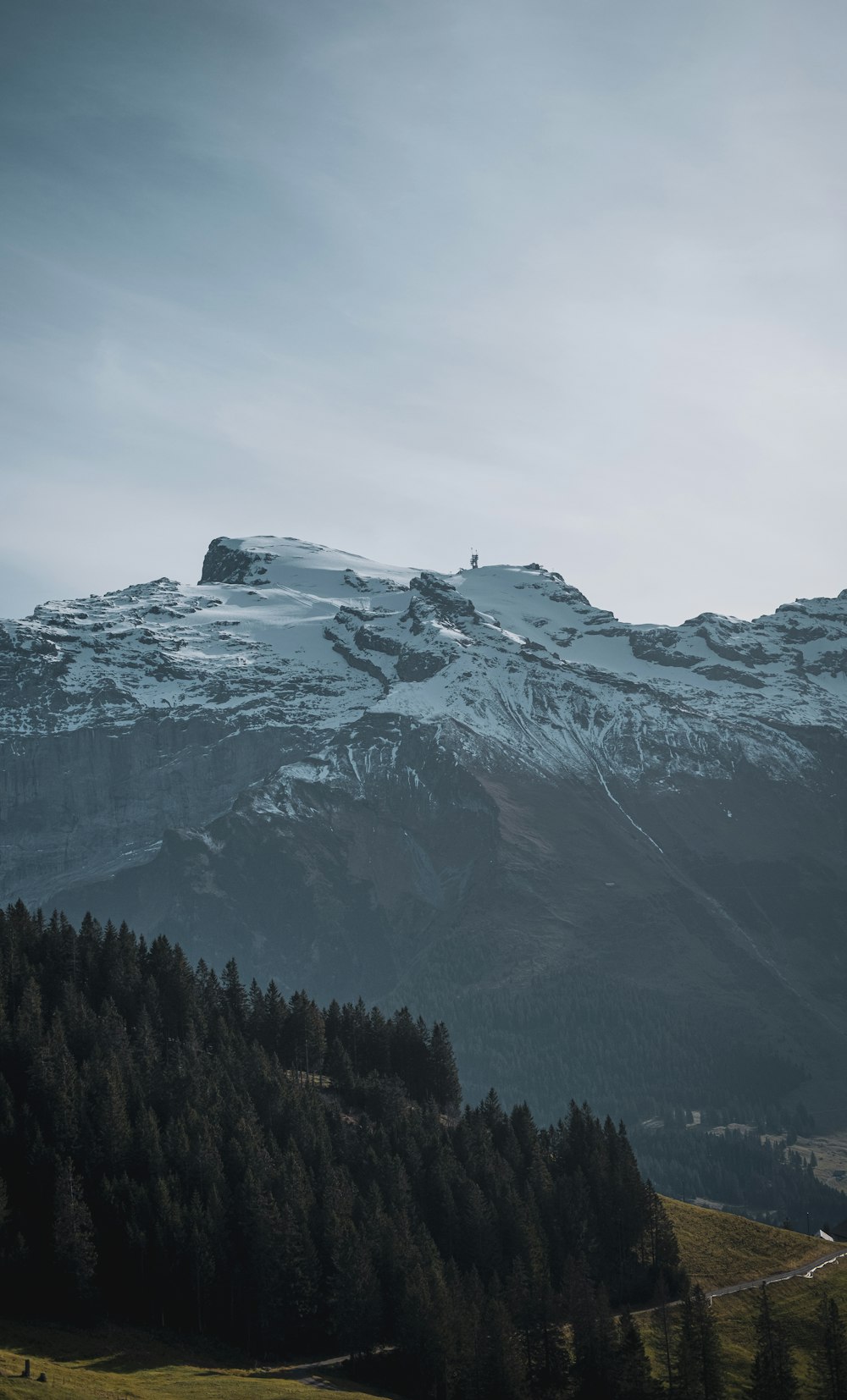 snow covered mountain during daytime