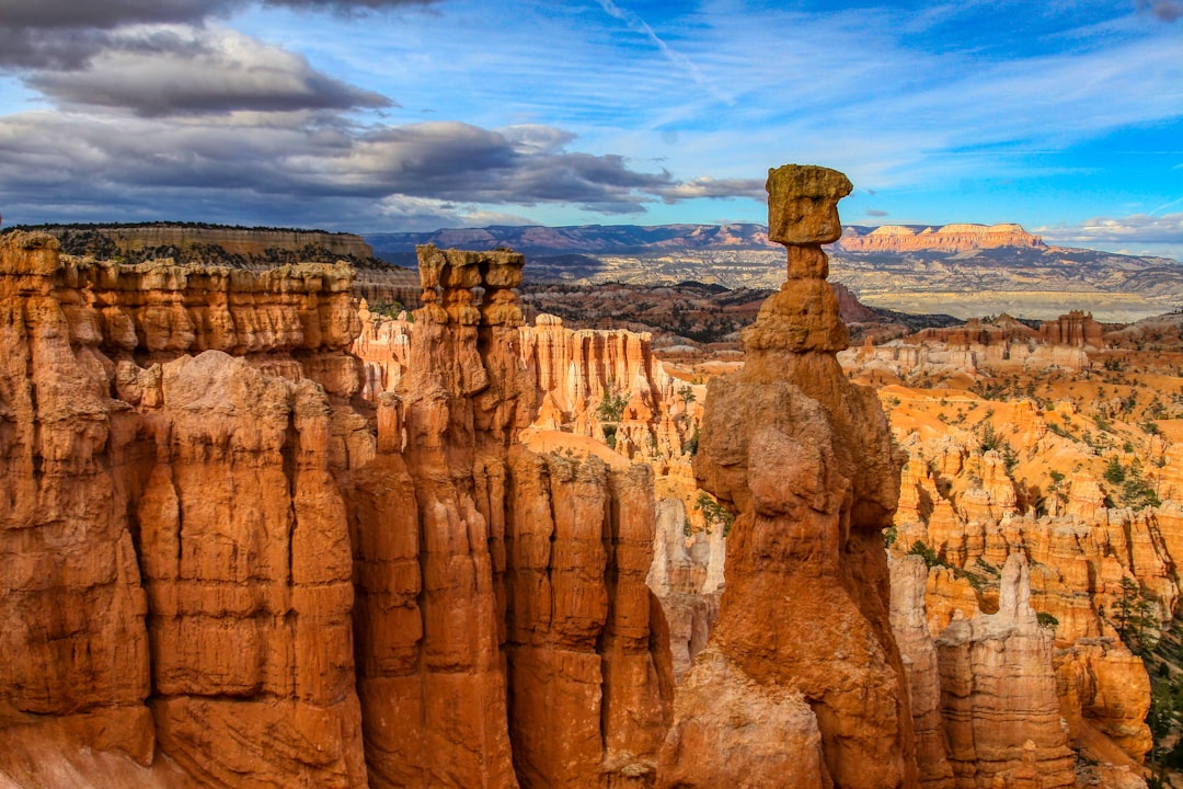 brown rock formation under blue sky during daytime