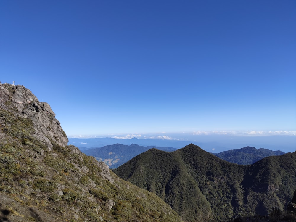 green and brown mountains under blue sky during daytime