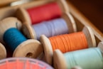red blue and white thread spool