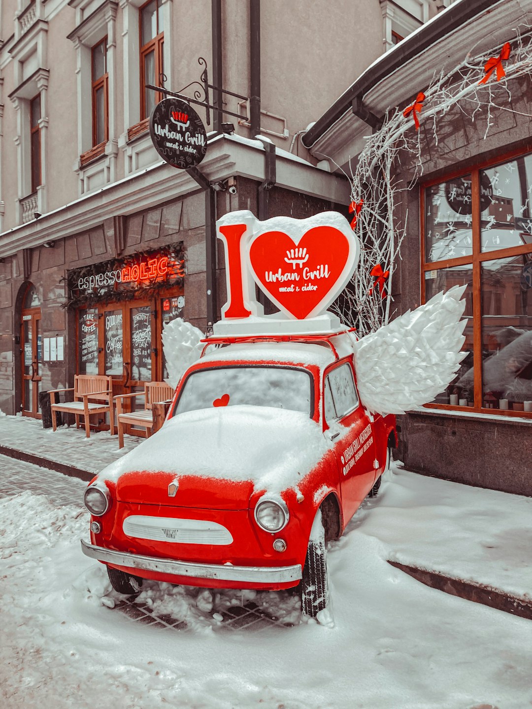 red volkswagen beetle parked on the street during daytime