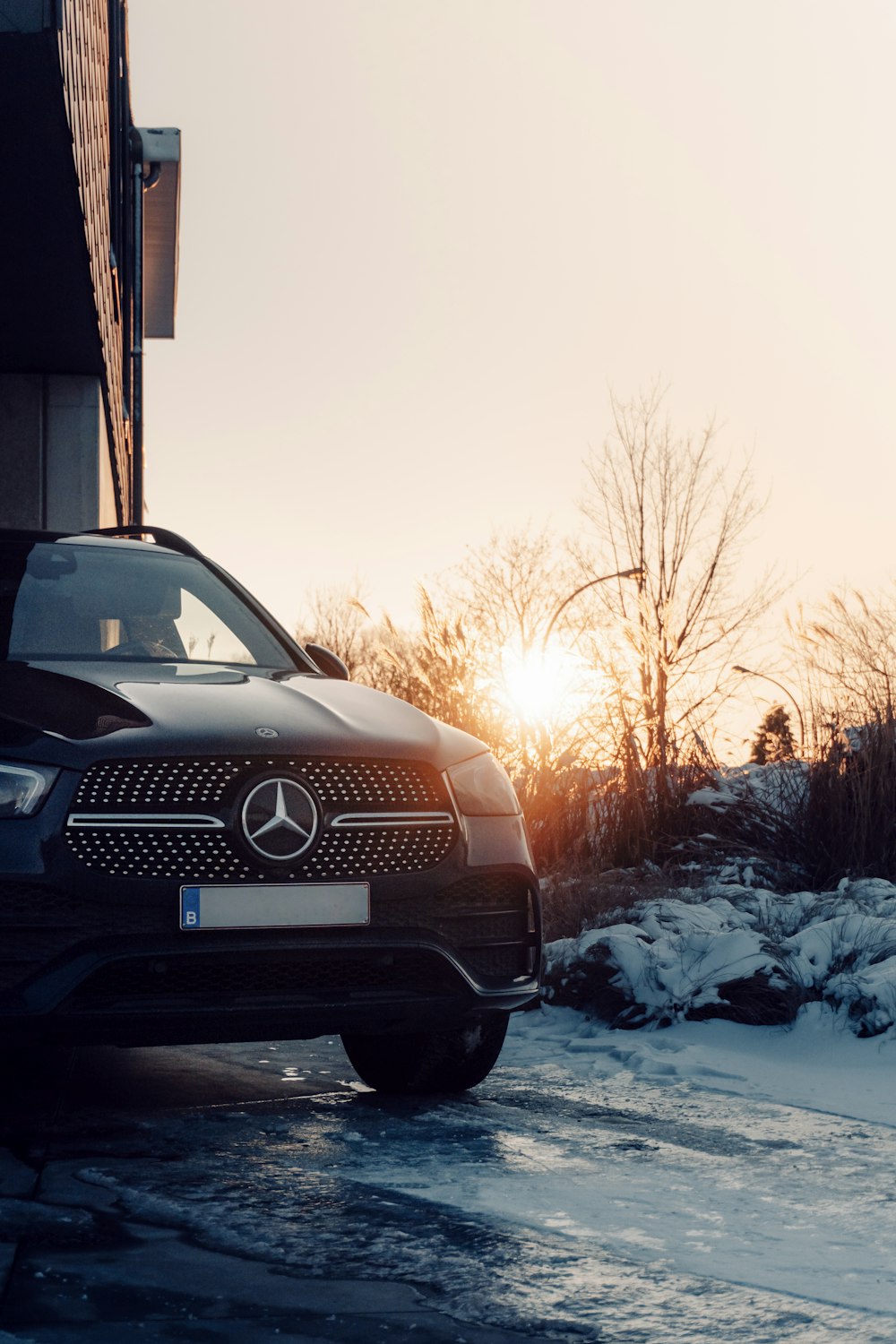 black audi car parked near house during daytime