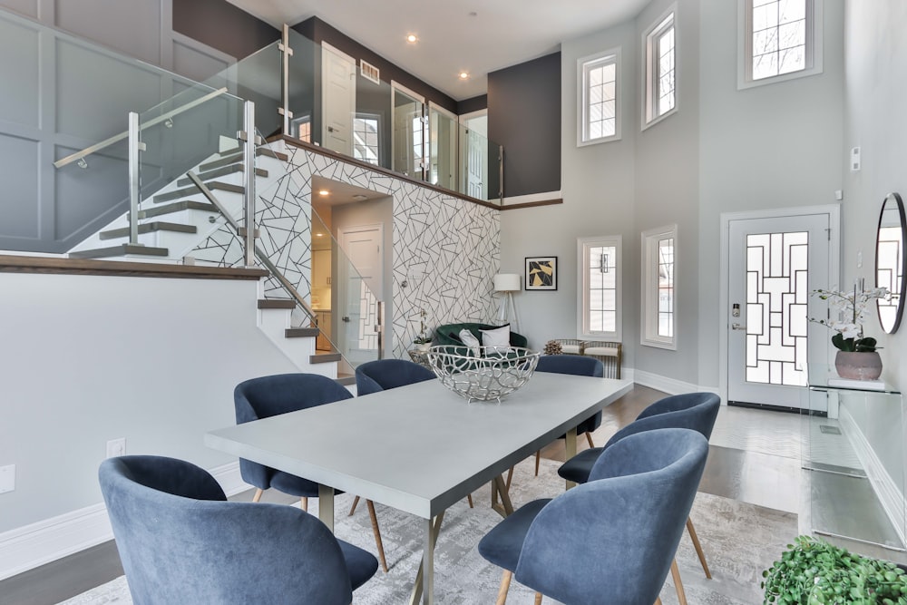 white and black wooden table with chairs