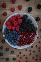 strawberries on white ceramic bowl