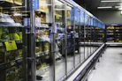 Cold storage room with neatly arranged frozen goods and advanced cooling units.