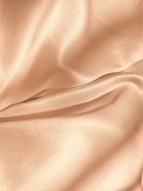 Close-up of the high-quality satin fabric highlighting its smooth texture.