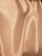 Smooth, flowing fabric with a shiny texture and soft folds, likely made of silk or satin.