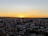 A vibrant sunset over a city skyline, showcasing the beauty of urban life.