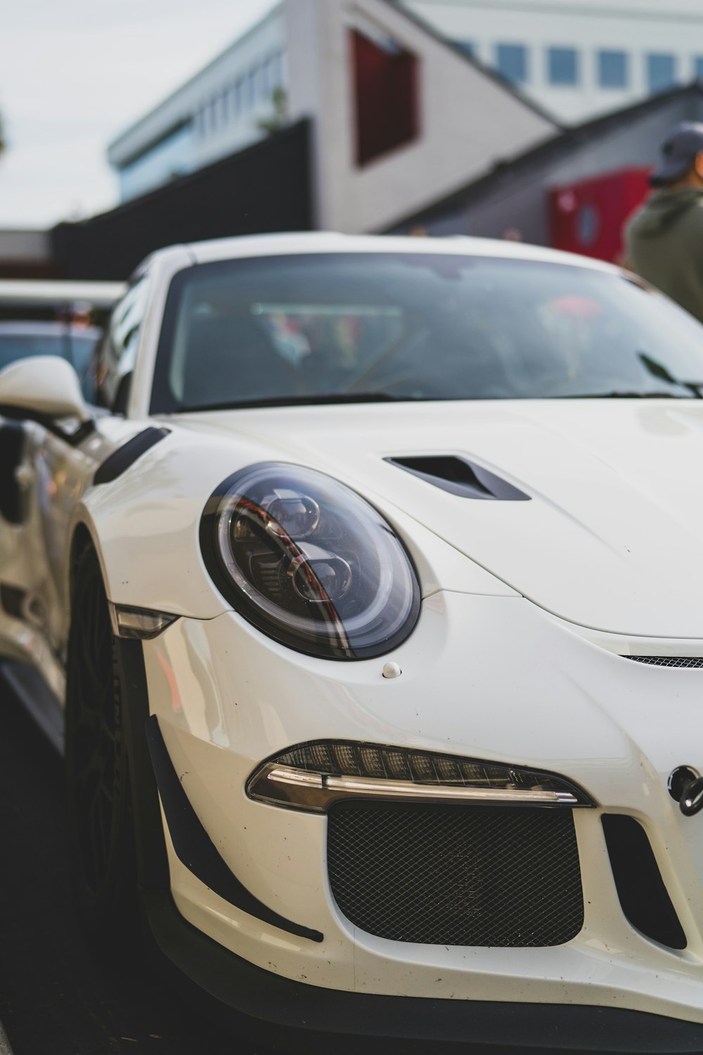 white and black porsche 911