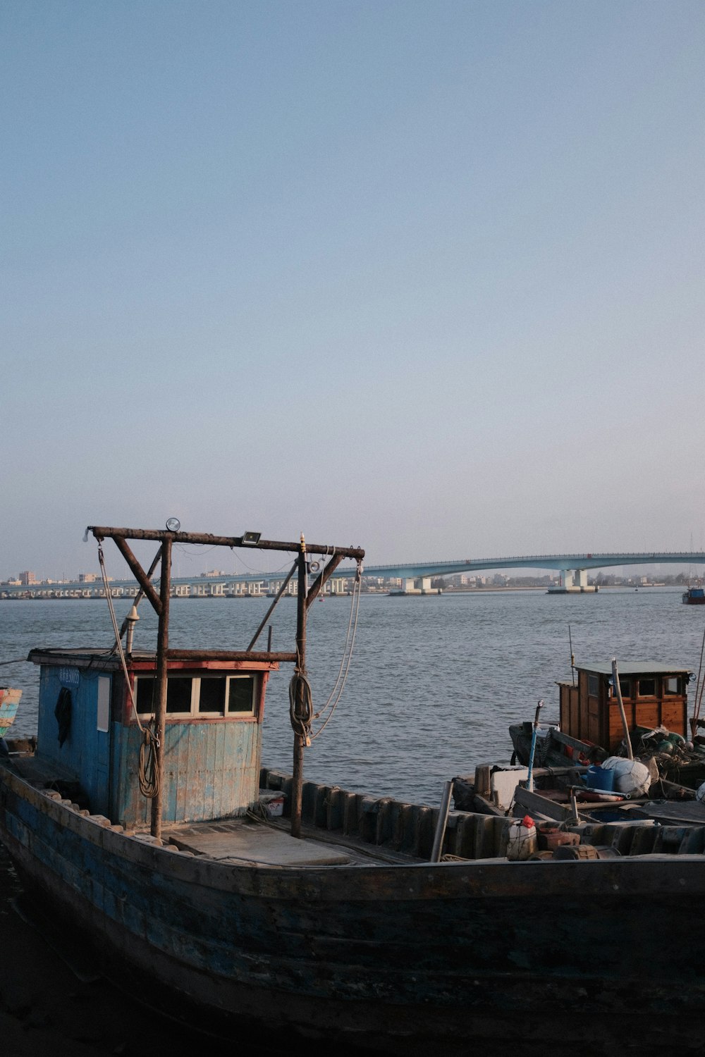 a boat sitting on top of a body of water