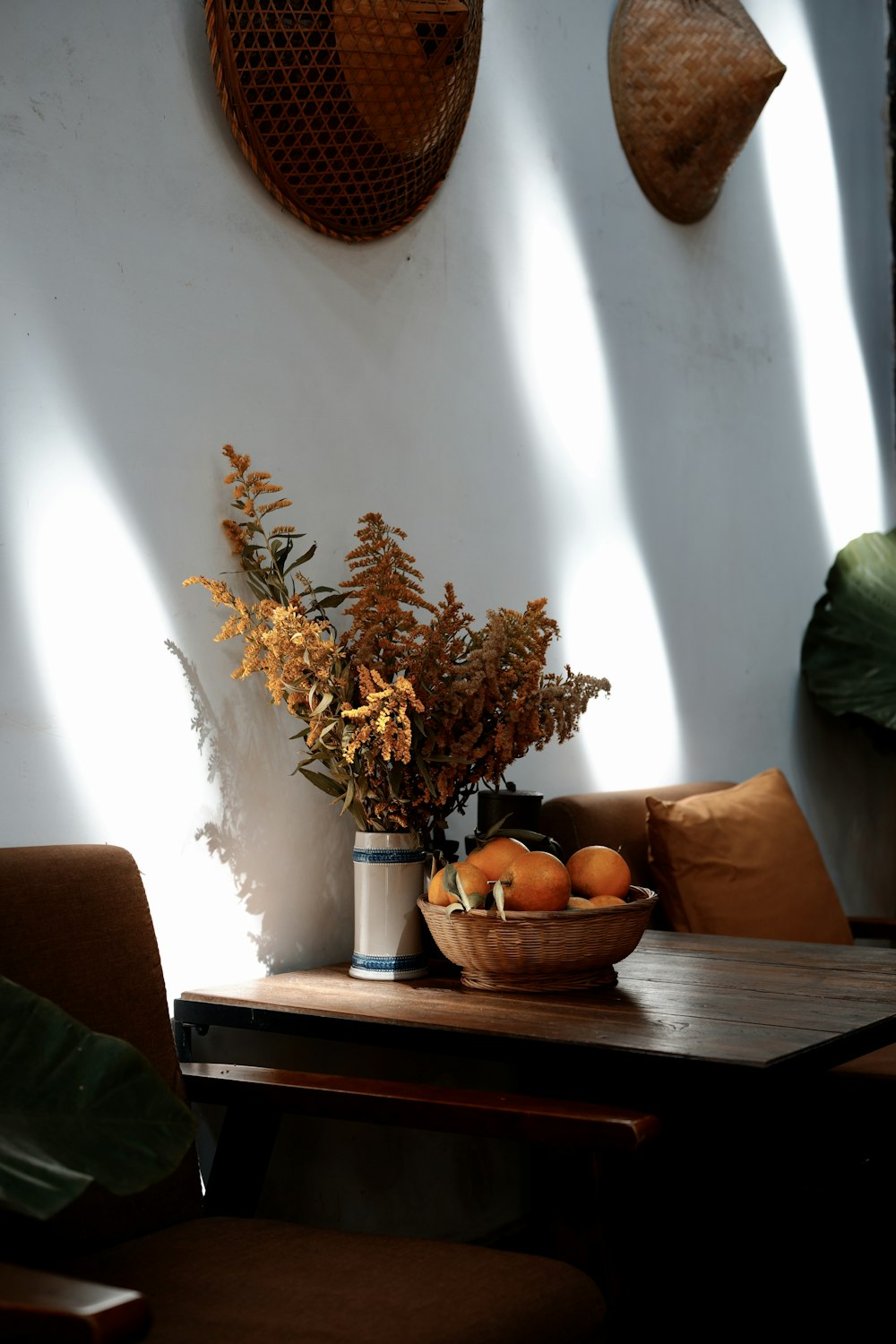 brown and green plant on brown wooden table