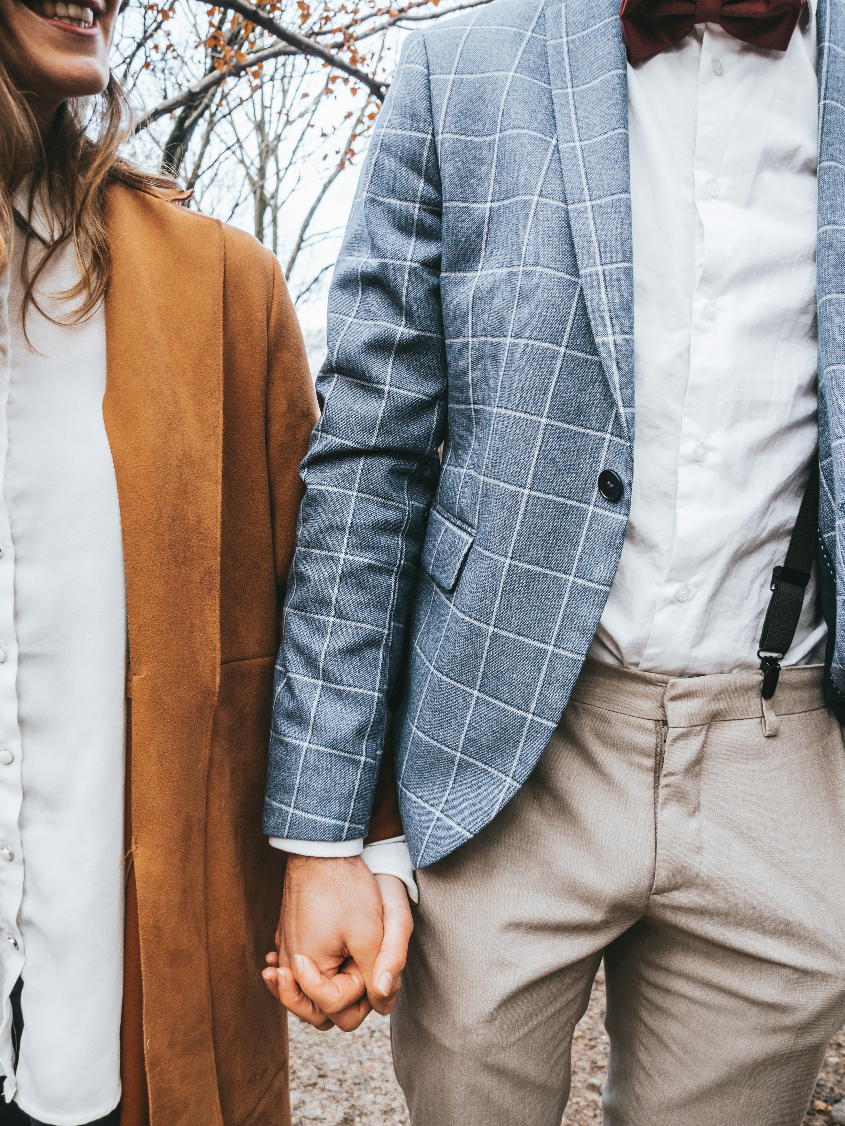 What to Wear on a First Date: Outfit Ideas That Make a Great Impression – man in gray suit jacket and woman in white dress shirt